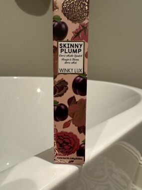 Winky lux skinny plum lipstick